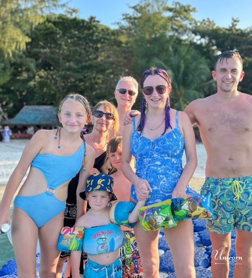 Racha Island & Coral Island Full Day Tour by Speedboat – Snorkeling & Buffet Lunch 15 Happy family enjoying Coral Island Phuket tour