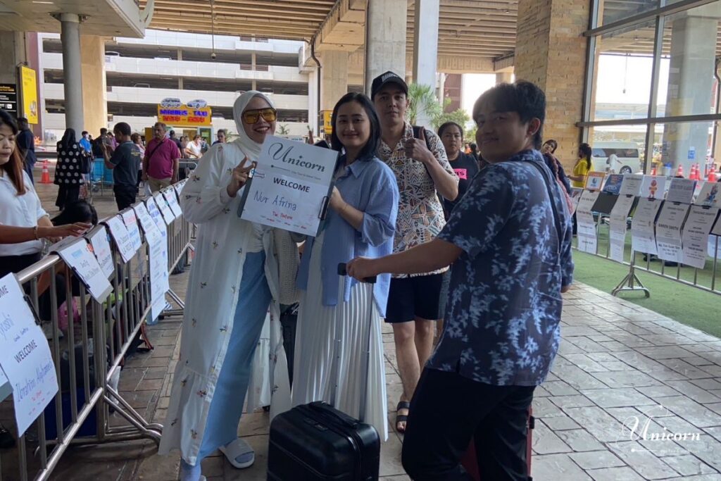 Private Taxi from Phuket to Donsak Pier – Your Easiest Route to Samui & Koh Phangan 10 Friendly driver with signboard waiting for airport pickup in Phuket