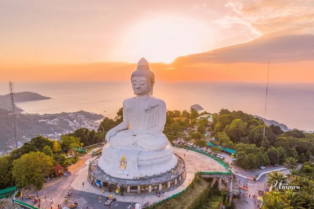Complete Guide to Hiring a Private Driver in Phuket 7 A panoramic view of the massive Big Buddha statue in Phuket, overlooking the beautiful sea and mountains.