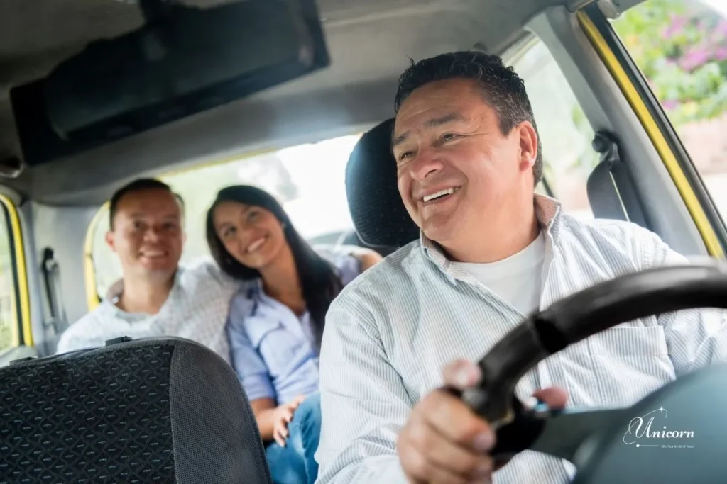 Complete Guide to Hiring a Private Driver in Phuket 3 A friendly Phuket private driver and a group of happy tourists, highlighting the personalized service of the tour.