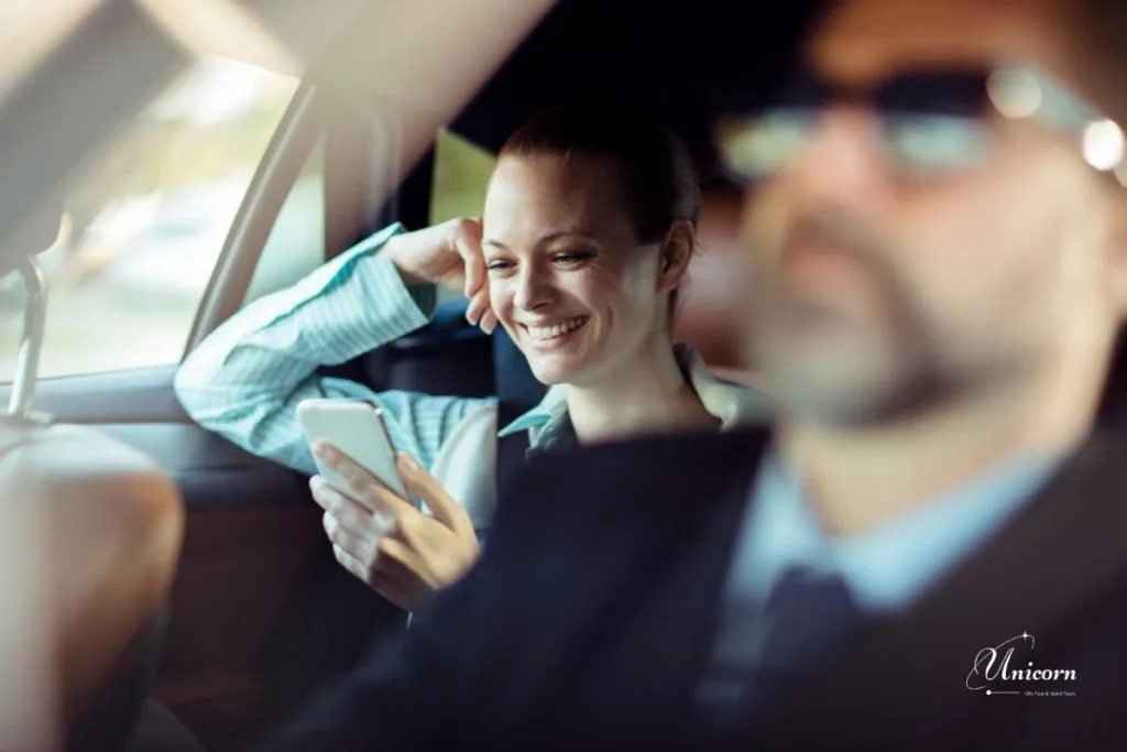 Complete Guide to Hiring a Private Driver in Phuket 4  A tourist taking a spontaneous photo at a scenic viewpoint, highlighting the flexibility of a private driver tour in Phuket.