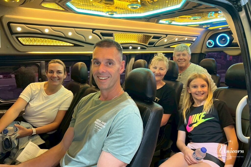 Private Taxi from Phuket to Donsak Pier – Your Easiest Route to Samui & Koh Phangan 11 Family enjoying a private taxi ride from Phuket to Donsak Pier