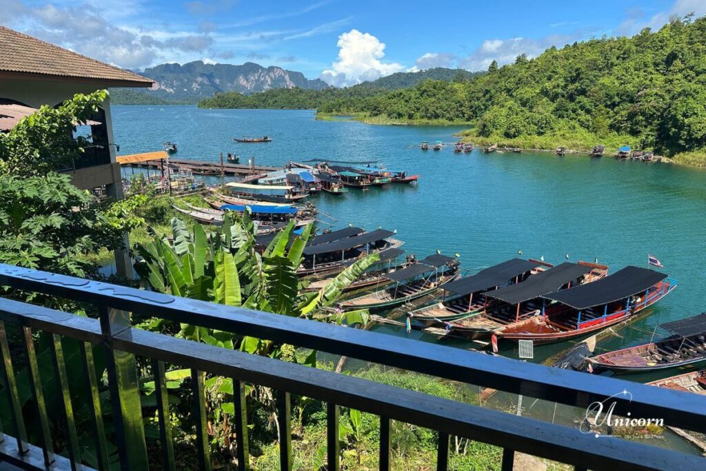Private Transfer from Phuket to Cheow Lan Lake (Ratchaprapha Dam, Khao Sok) 1 Ratchaprapha Pier at Cheow Lan Lake in Khao Sok — starting point for floating bungalow trips after private transfer from Phuket.